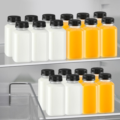 Izolowane plastikowe butelki na herbatę z mlekiem z uchwytem przeciekającym w różnych pojemnościach