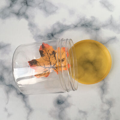 Słoiki plastikowe o średnicy 85 mm z uszczelnieniem z folii aluminiowej, idealne do bezpiecznego pakowania i przechowywania różnych produktów