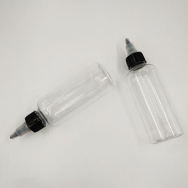 Przejrzyste/kolorowe plastikowe pojemniki z wierzchołkiem śrubowym do przechowywania płynów