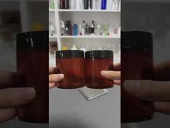 Sprzedaż hurtowa niestandardowych luksusowych pustych plastikowych słoiczków na krem kosmetyczny z wieczkami